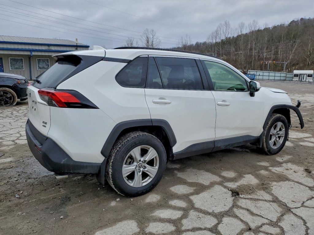 A buyer bidding successfully on a car at a Copart auction yard