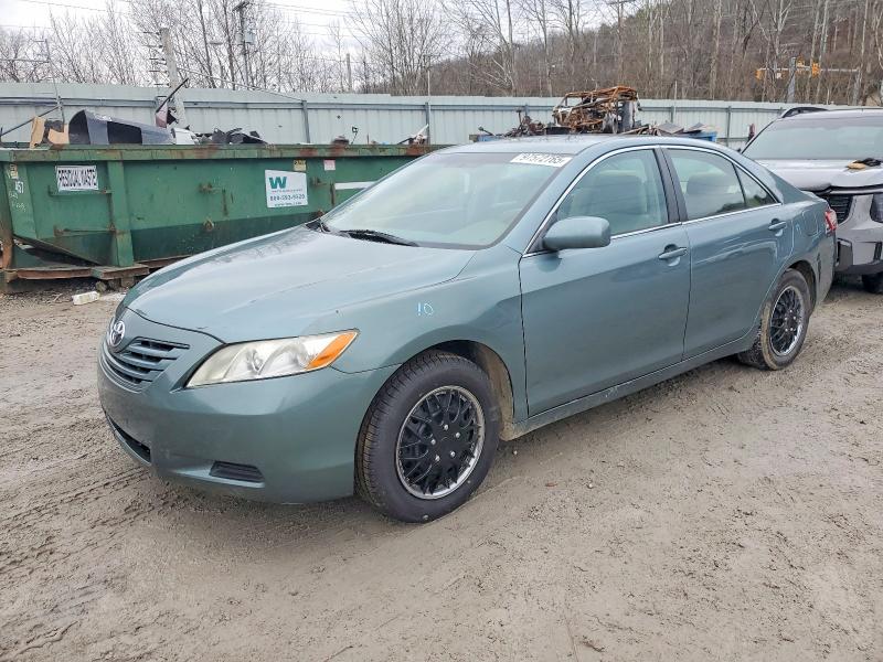 Buyer successfully bidding on a car at a secure Copart auction yard